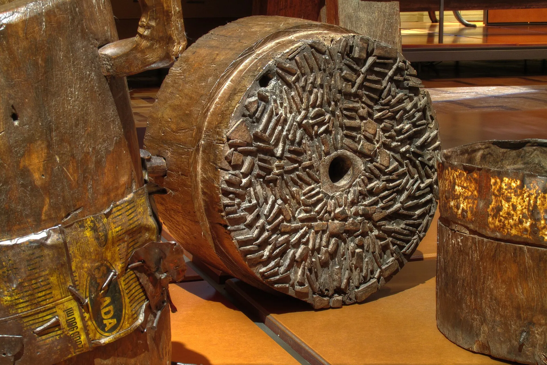 A close-up of a freshly dressed millstone showing its carved radial furrows